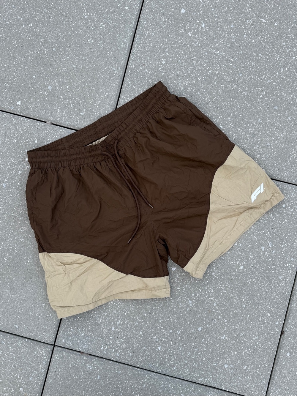 Brown Pacsun x Formula 1 shorts